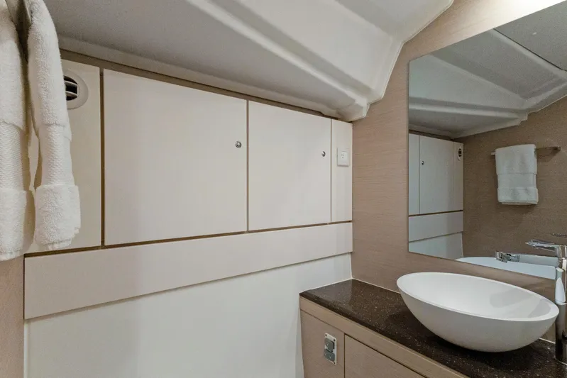 Beatrice Yacht Photos Pics Modern bathroom interior of 2021 Jeanneau Sun Odyssey 51 Performance yacht.
