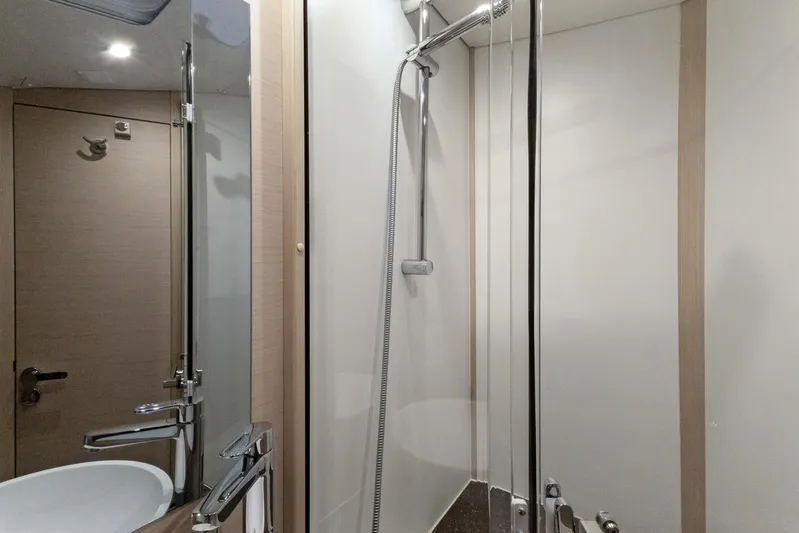 Beatrice Yacht Photos Pics Modern bathroom interior of 2021 Jeanneau Sun Odyssey 51 Performance yacht.