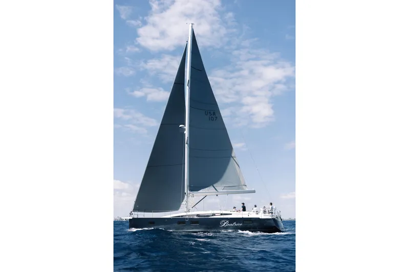 Beatrice Yacht Photos Pics 2021 Jeanneau Sun Odyssey 51 Performance sailing on open sea under clear skies.