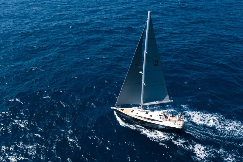 Beatrice Yacht Photos Pics Aerial view of 2021 Jeanneau Sun Odyssey 51 Performance sailing on open sea.