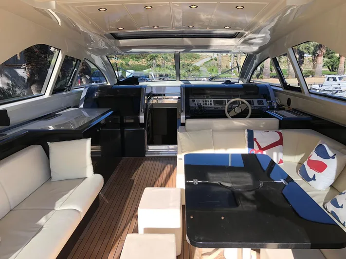  Yacht Photos Pics Luxurious interior of a 2006 Riva Super Ego 68 yacht with elegant seating and modern design.