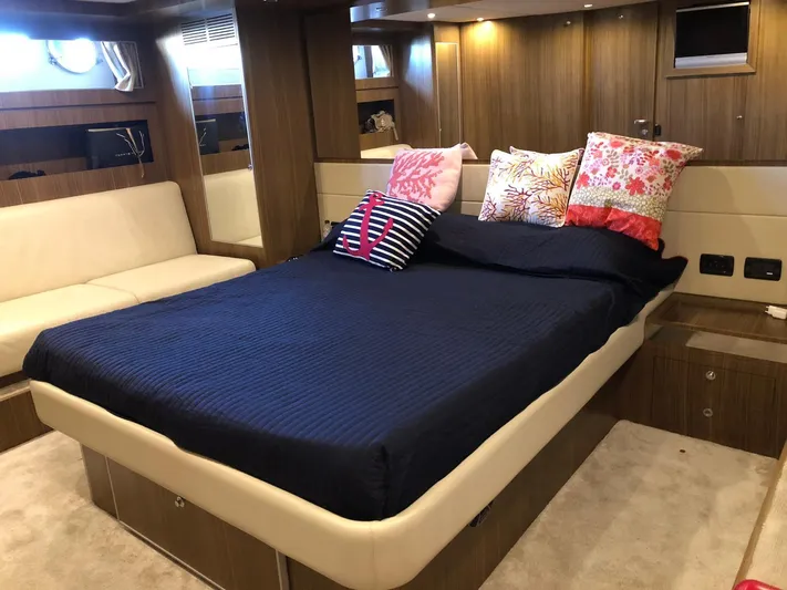  Yacht Photos Pics Luxurious cabin interior of 2006 Riva Super Ego 68 yacht with elegant bedding.