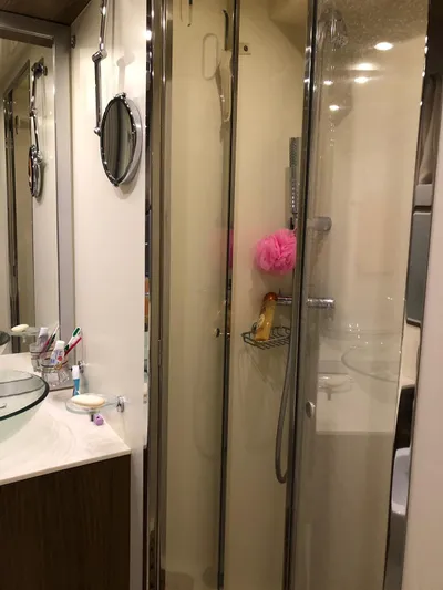  Yacht Photos Pics Bathroom interior of 2006 Riva Super Ego 68 yacht with shower and vanity.