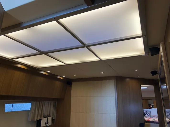  Yacht Photos Pics Interior of 2006 Riva Super Ego 68 yacht with modern ceiling lighting.