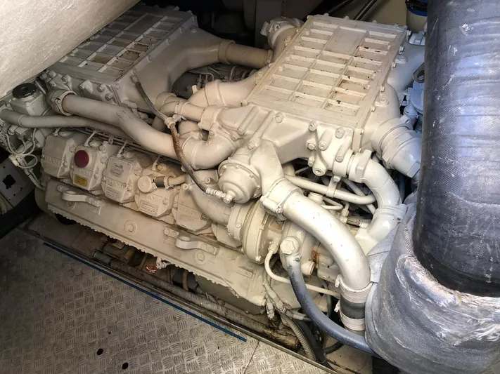  Yacht Photos Pics Engine compartment of a 2006 Riva Super Ego 68 yacht, showcasing intricate machinery.