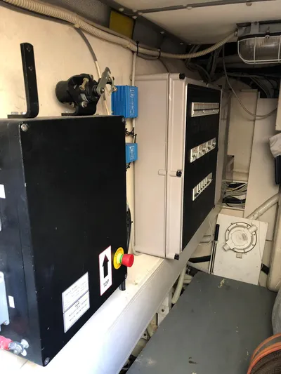  Yacht Photos Pics Electrical control panel inside 2006 Riva Super Ego 68 yacht, showcasing wiring and components.