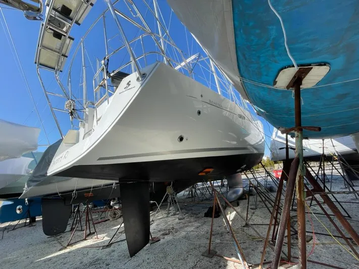 Rob Roy Yacht Photos Pics Beneteau Oceanis 46 sailboat from 2008 on dry dock, viewed from the stern.