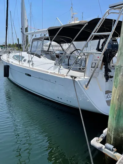 Rob Roy Yacht Photos Pics 2008 Beneteau Oceanis 46 sailboat docked in marina, side view.