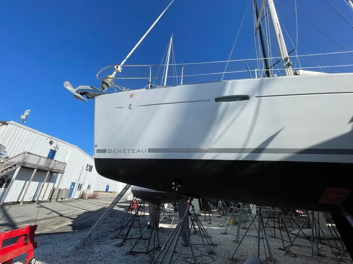 Rob Roy Yacht Photos Pics 2008 Beneteau Oceanis 46 sailboat on stands, blue sky background.