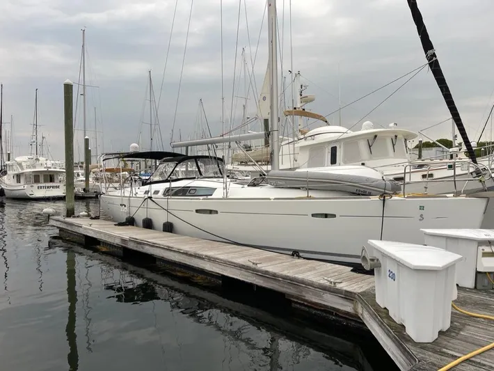 Rob Roy Yacht Photos Pics 2008 Beneteau Oceanis 46 yacht docked at marina, overcast sky.