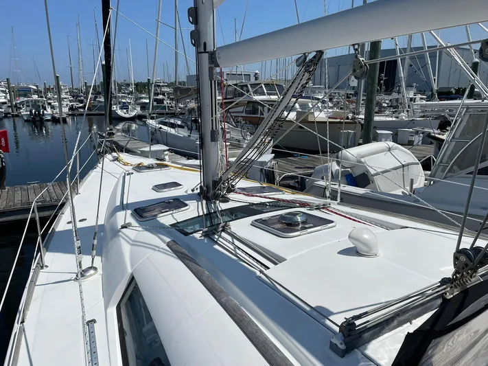 Rob Roy Yacht Photos Pics 2008 Beneteau Oceanis 46 sailboat docked in a marina, showcasing deck and rigging.