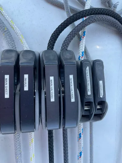 Rob Roy Yacht Photos Pics Close-up of labeled rope clutches on a 2008 Beneteau Oceanis 46 sailboat.