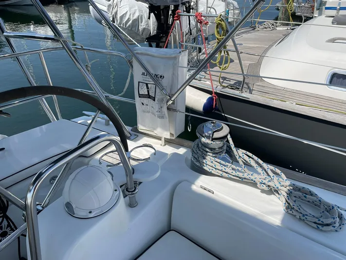 Rob Roy Yacht Photos Pics Beneteau Oceanis 46 sailboat deck with winch and ropes, docked at marina, 2008 model.