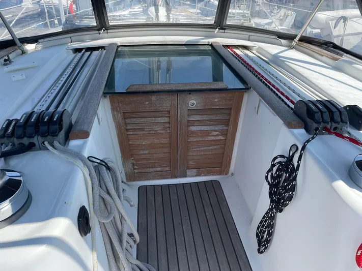 Rob Roy Yacht Photos Pics Cockpit of 2008 Beneteau Oceanis 46 sailboat with wooden hatch and rigging lines.