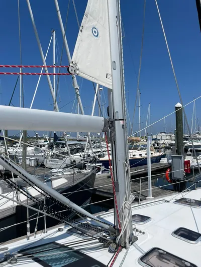 Rob Roy Yacht Photos Pics Beneteau Oceanis 46 sailboat docked at marina, showcasing mast and rigging, 2008 model.