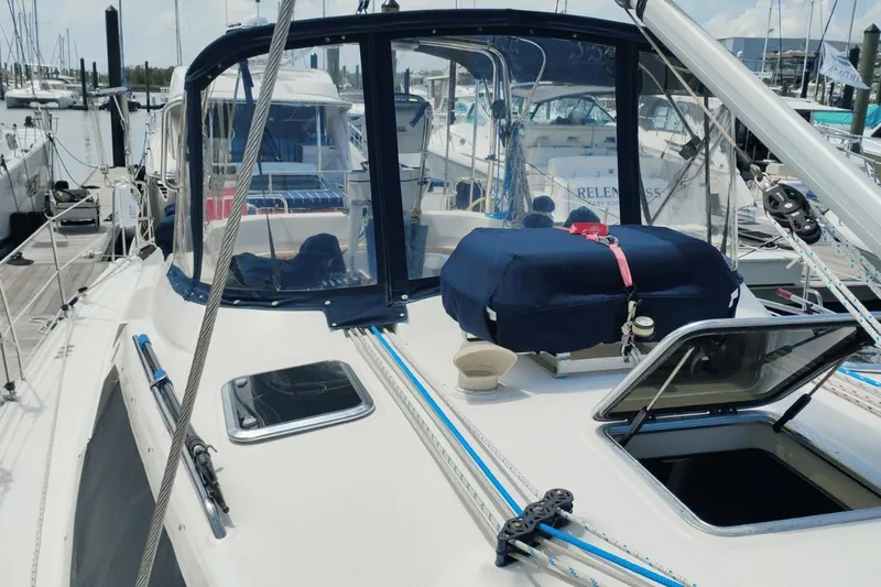  Yacht Photos Pics 2009 Hunter 50 Center Cockpit sailboat docked at marina, featuring spacious deck and cockpit.