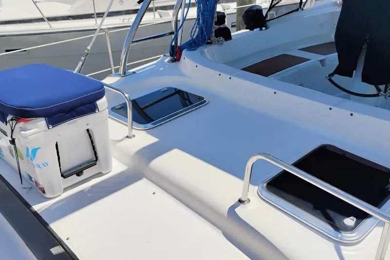  Yacht Photos Pics Hunter 50 Center Cockpit 2009 sailboat deck with seating and storage hatches.