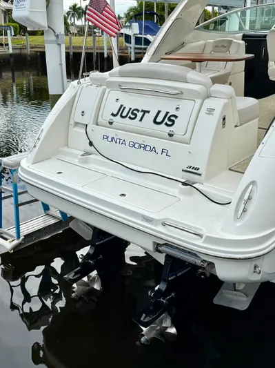 Just Us Yacht Photos Pics 2010 Sea Ray 310 Sundancer boat docked, named "Just Us," Punta Gorda, FL.