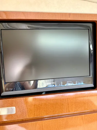 Just Us Yacht Photos Pics Toshiba TV in 2010 Sea Ray 310 Sundancer boat interior.