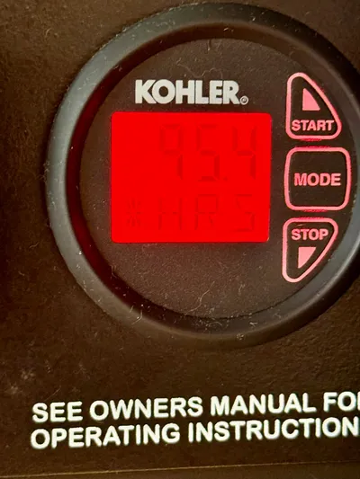 Just Us Yacht Photos Pics Kohler generator display showing 95.4 hours on a 2010 Sea Ray 310 Sundancer.