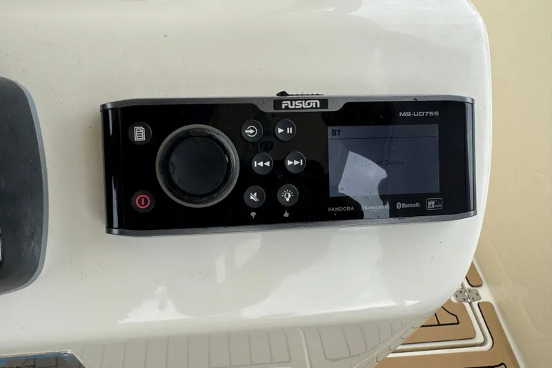  Yacht Photos Pics Fusion MS-UD755 audio system on 2015 Cobia 344 Center Console boat dashboard.