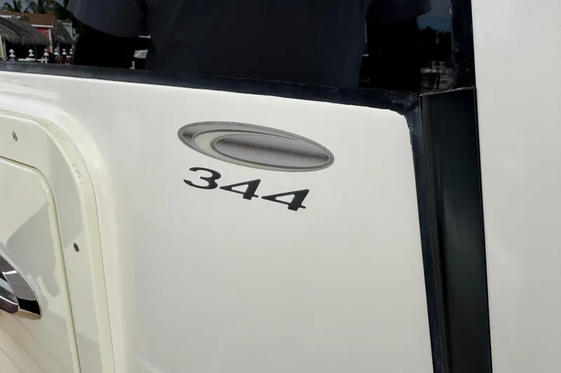  Yacht Photos Pics 2015 Cobia 344 Center Console boat emblem and model number detail.