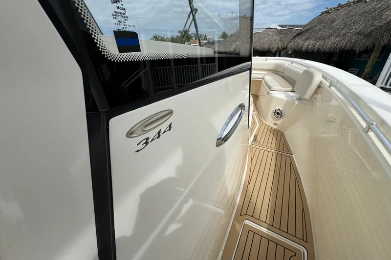 Yacht Photos Pics 2015 Cobia 344 Center Console boat with teak flooring and sleek design.