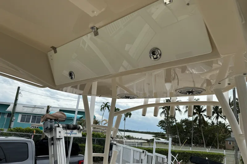  Yacht Photos Pics 2015 Cobia 344 Center Console boat with overhead storage and rod holders.