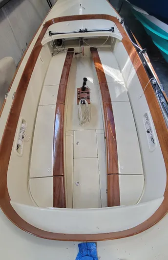 Caprice Yacht Photos Pics 2023 C.W. Hood 32 Daysailer interior with wooden accents and sleek design.