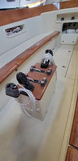 Caprice Yacht Photos Pics 2023 C.W. Hood 32 Daysailer interior with ropes and wooden seating.