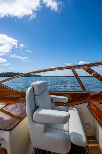 Pampelonne Yacht Photos Pics 2018 Hinckley 34 Runabout boat interior with luxurious seating and scenic water view.