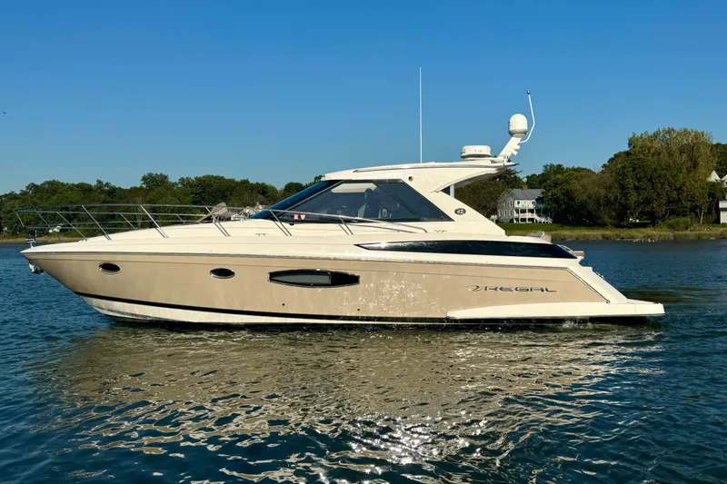  Yacht Photos Pics 2018 Regal 42 Sport Coupe yacht cruising on a sunny day.