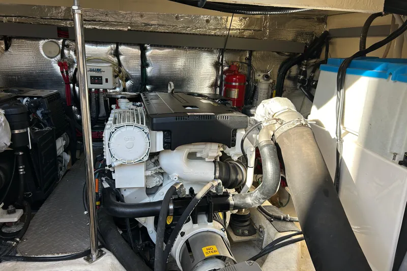  Yacht Photos Pics Engine room of 2018 Regal 42 Sport Coupe with visible machinery and components.