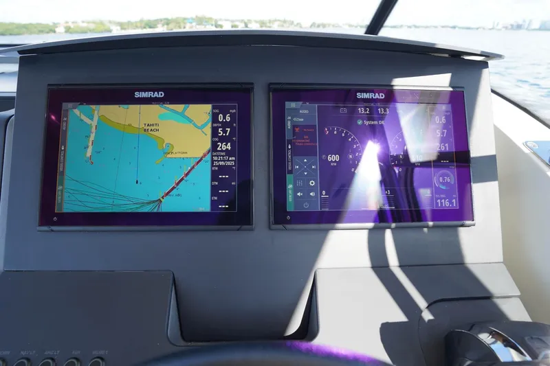 T/t Sophia Yacht Photos Pics Dashboard of 2022 Nimbus T11 boat with dual Simrad navigation displays.
