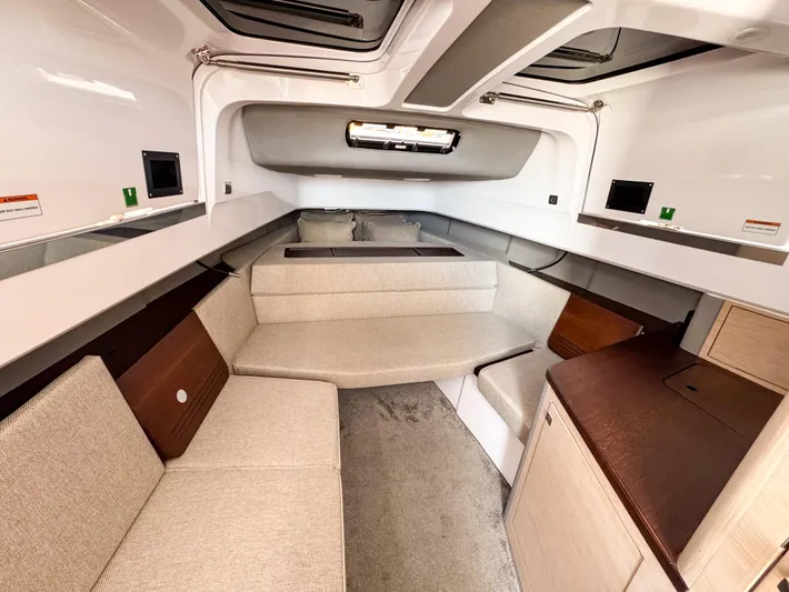  Yacht Photos Pics Luxurious interior of 2024 Axopar 45 ST BRABUS Trim Mediterrana boat, featuring elegant seating and modern design.