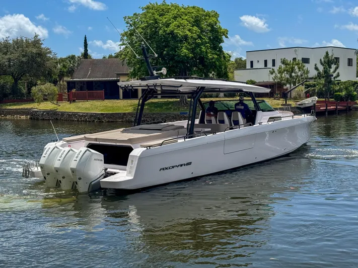  Yacht Photos Pics 2024 Axopar 45 ST BRABUS Trim Mediterrana cruising on a scenic waterway.