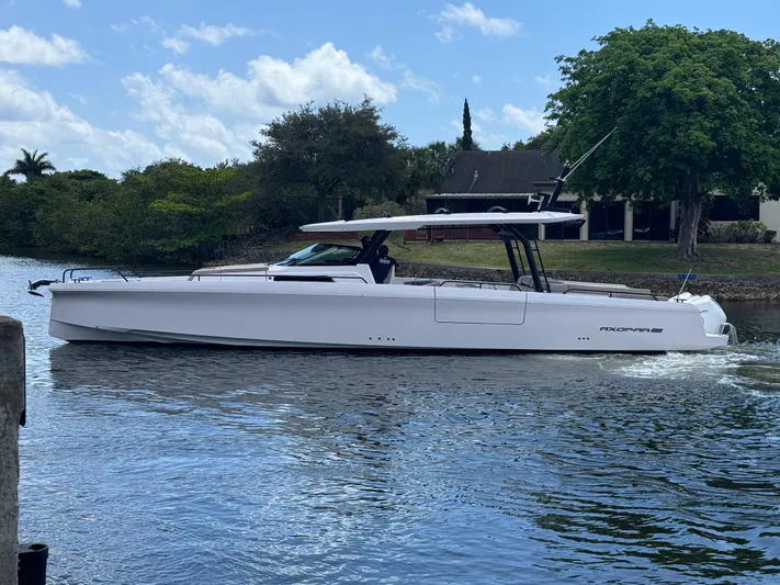  Yacht Photos Pics 2024 Axopar 45 ST BRABUS Trim Mediterrana cruising on a serene waterway.