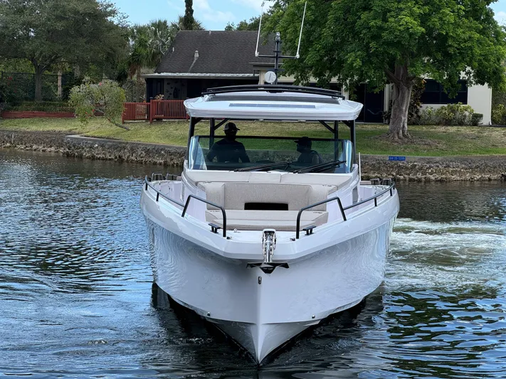  Yacht Photos Pics 2024 Axopar 45 ST BRABUS Trim Mediterrana cruising on a calm waterway.