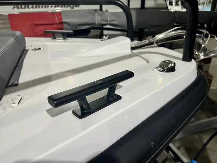 Escape Artist Yacht Photos Pics 2020 Axopar 37 Cross Cabin BRABUS boat deck detail with cleat and railing.