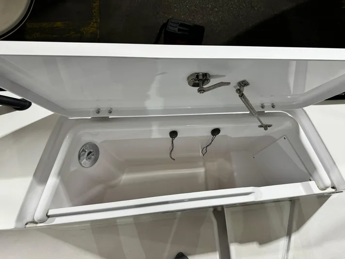 Escape Artist Yacht Photos Pics Open storage compartment in 2020 Axopar 37 Cross Cabin BRABUS boat.