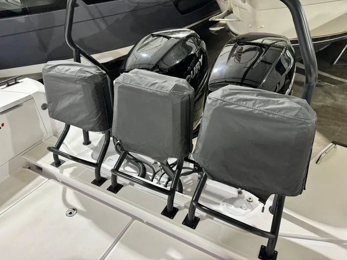 Escape Artist Yacht Photos Pics 2020 Axopar 37 Cross Cabin BRABUS with triple outboard engines, covered and secured.