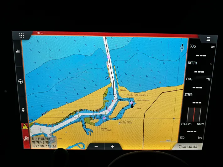 Escape Artist Yacht Photos Pics Navigation display on Axopar 37 XC, 2020 model, showing coastal map and route details.