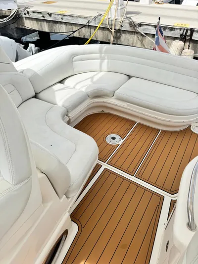  Yacht Photos Pics 2004 Sea Ray 340 Sundancer boat with white seating and teak flooring.