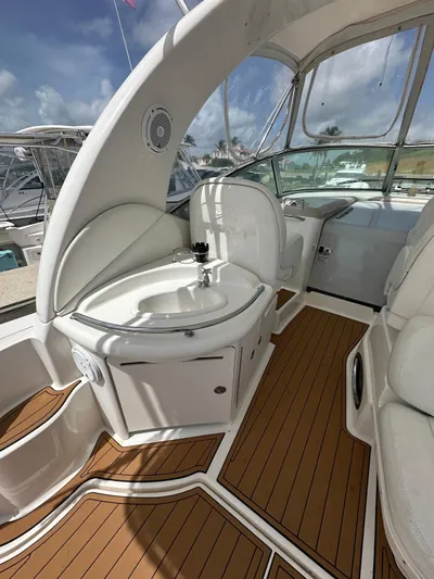  Yacht Photos Pics 2004 Sea Ray 340 Sundancer interior with sleek design and wood flooring.