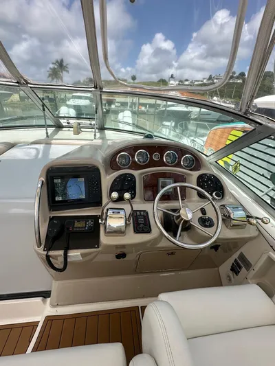  Yacht Photos Pics 2004 Sea Ray 340 Sundancer helm with modern controls and navigation system.