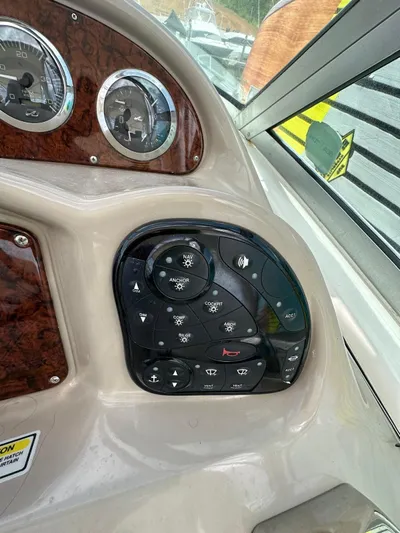  Yacht Photos Pics Control panel of 2004 Sea Ray 340 Sundancer boat with gauges and switches.