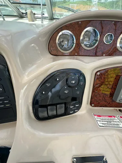  Yacht Photos Pics 2004 Sea Ray 340 Sundancer dashboard with gauges and controls.