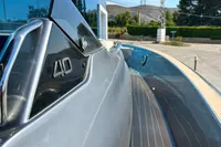 2025 Solaris Power 40F Open yacht, sleek design with metallic finish, docked outdoors.
