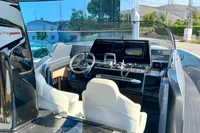 2025 Solaris Power 40F Open yacht cockpit with modern navigation system and sleek design.