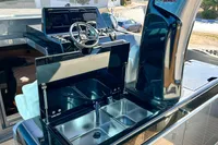 Luxury yacht interior with sleek kitchen and helm, Solaris Power 40F Open, 2025 model.
